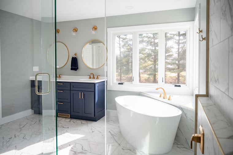 Bathroom remodel in South Bend, IN by Peacock and Company with freestanding tub and shower
