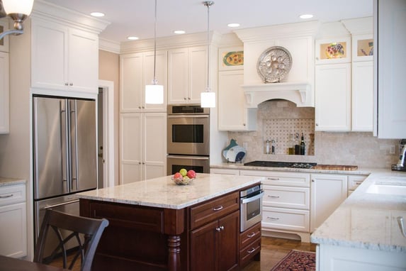 Beige kitchen remodel with recessed lighting