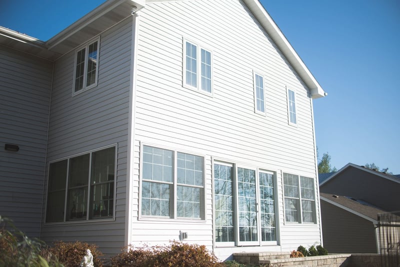 Custom sunroom and master bedroom addition exterior 