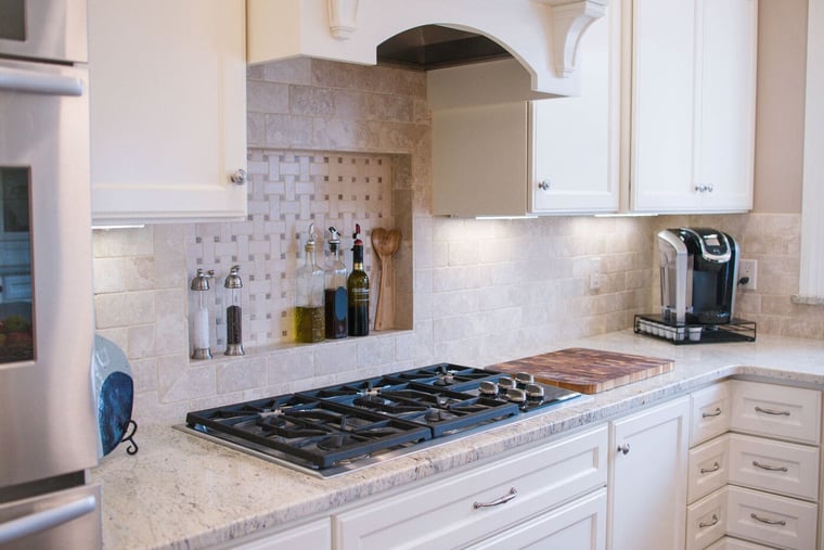 Custom under-cabinet task lighting near cooktop in South Bend kitchen remodel