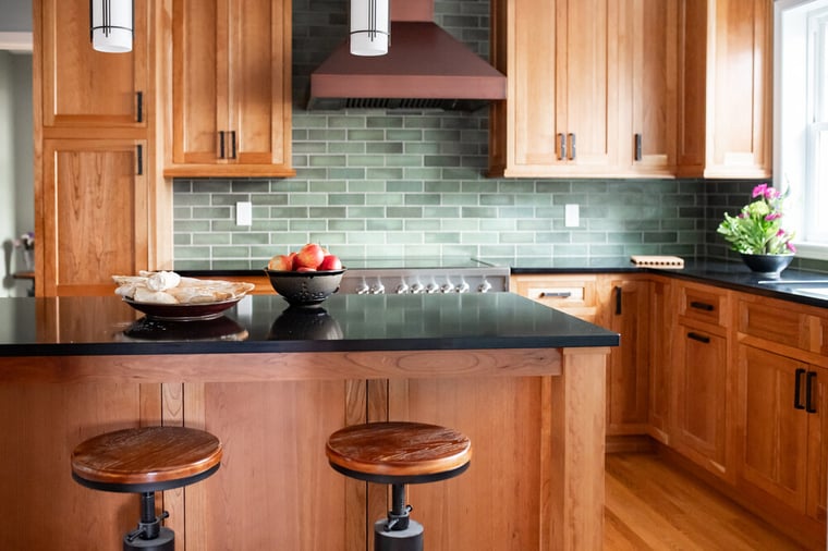 Island with seating in kitchen remodel by Peacock & Co in South Bend