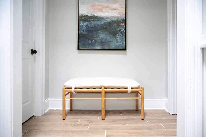 Hallway in South Bend home remodel with wood-appearance porcelain tile