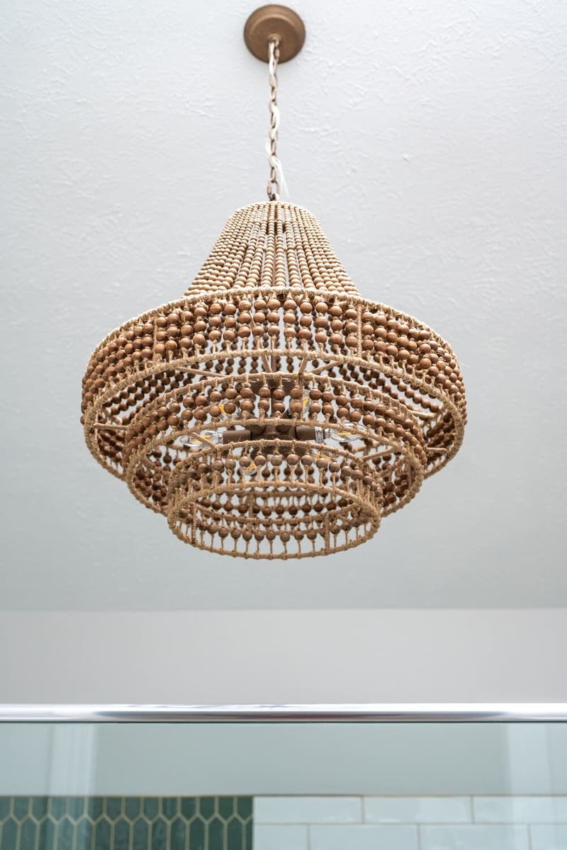 Hanging pendant light in Granger, IN primary bathroom remodel