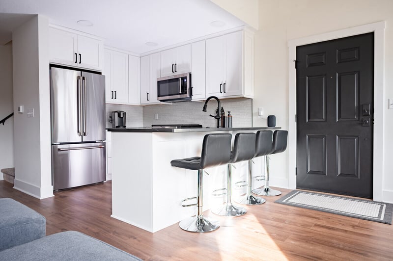 Condo kitchen remodel with open-concept kitchen by Peacock & Company