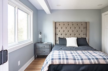 Primary bedroom in South Bend condo remodel by Peacock & Company
