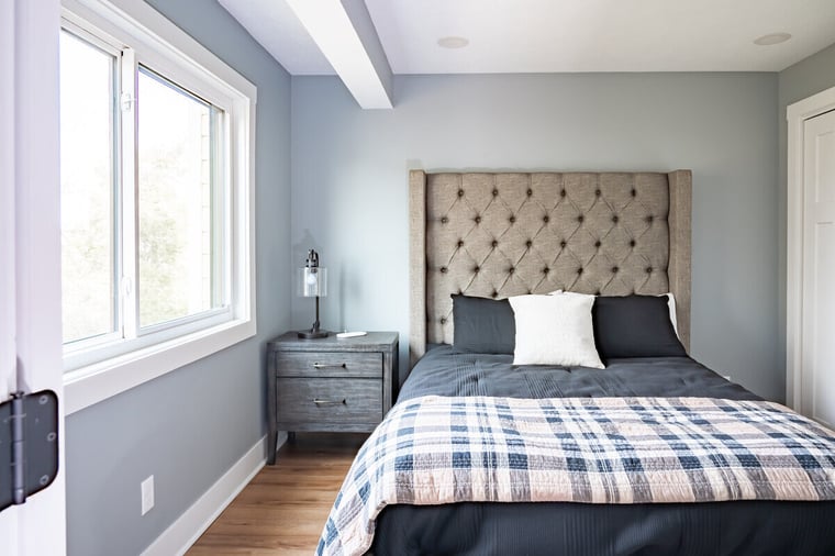 Primary bedroom in South Bend condo remodel by Peacock & Company