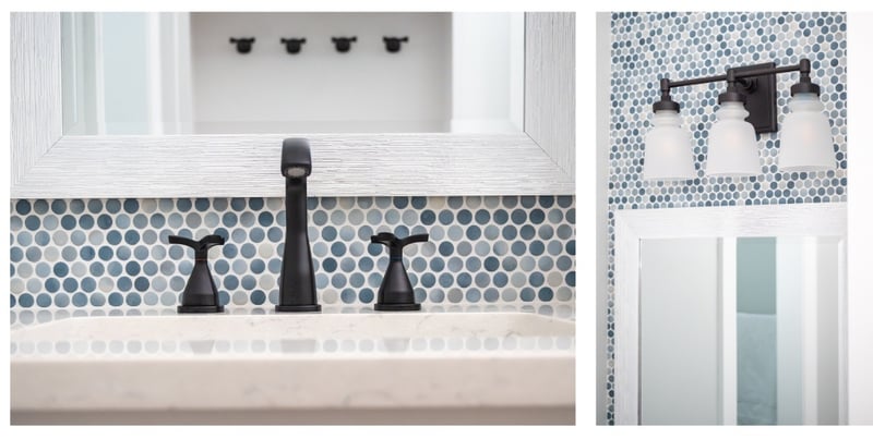Kids bathroom remodel with blue circle tile backsplash with black fixtures in Granger, Indiana