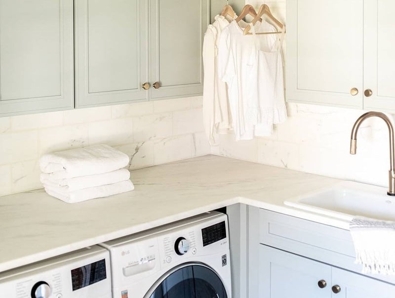 Laundry room renovation with shaker cabinets by Peacock & Company