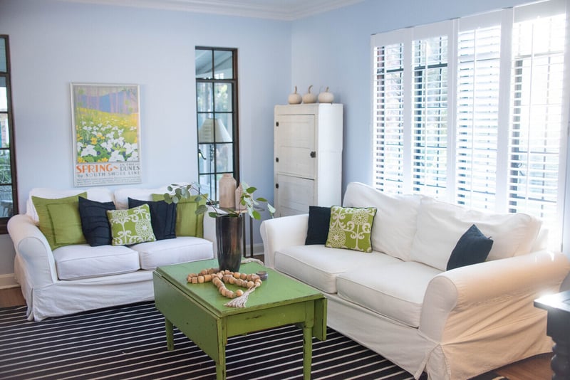 Living room in South Bend home remodel with natural light from windows by Peacock and Company