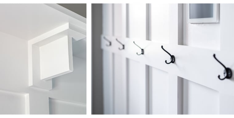 Millwork and custom coat hooks in mudroom remodel in Granger, Indiana