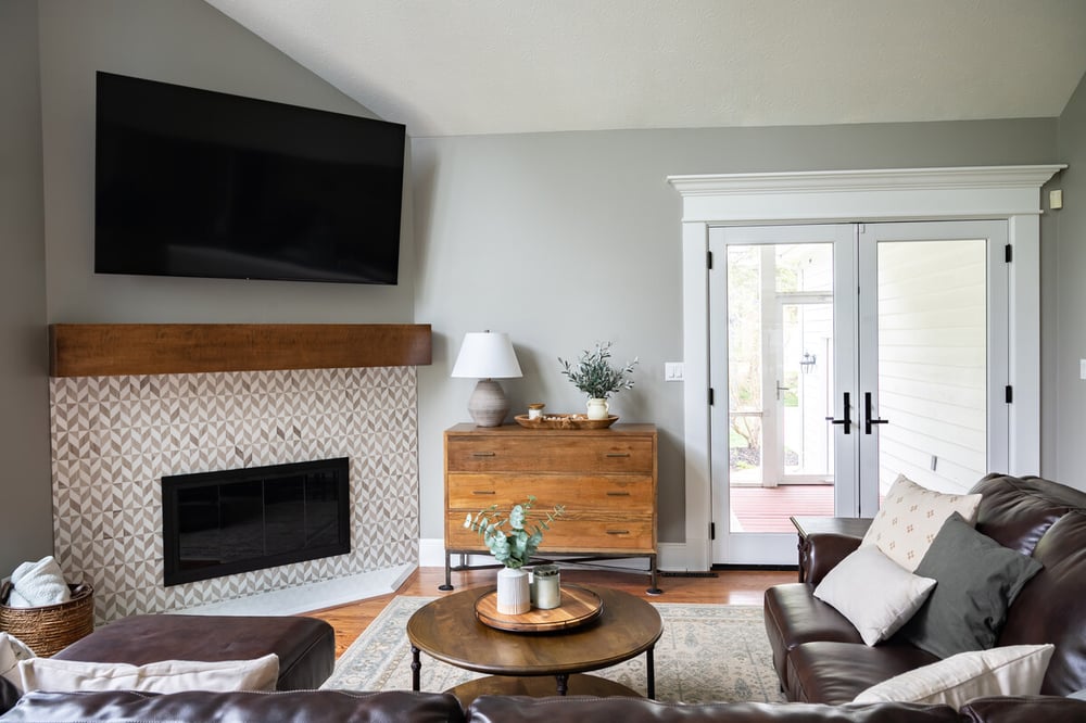 Modern South Bend living room remodel with fireplace and wooden mantel