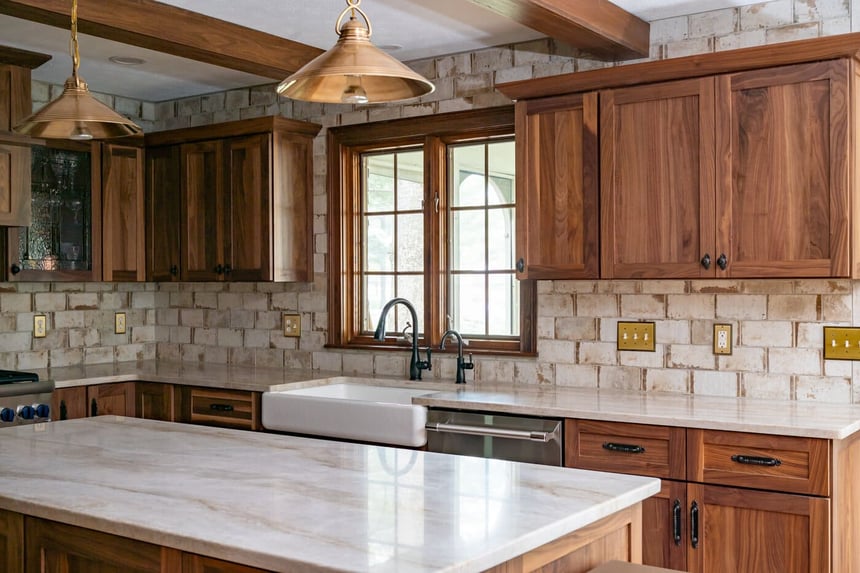Modern craftsman style kitchen in South Bend with natural stone countertop and wood cabinetry