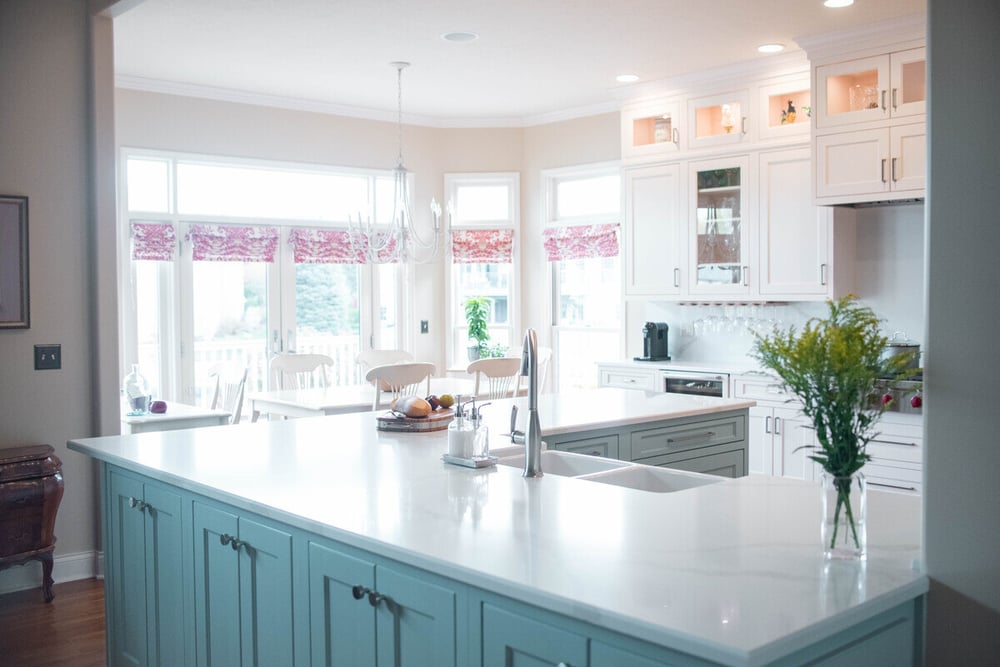 Open-concept kitchen remodel with L-Shaped island in South Bend, IN by Peacock and Company