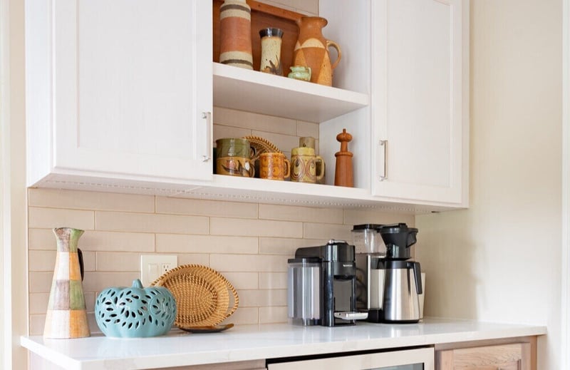 Open-shelving above beverage station in South Bend kitchen remodel by Peacock & Company