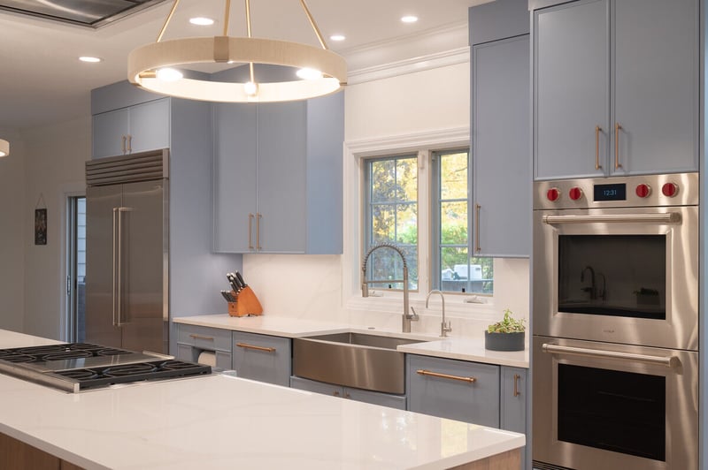 Double oven in blue Granger, IN kitchen remodel by Peacock & Company