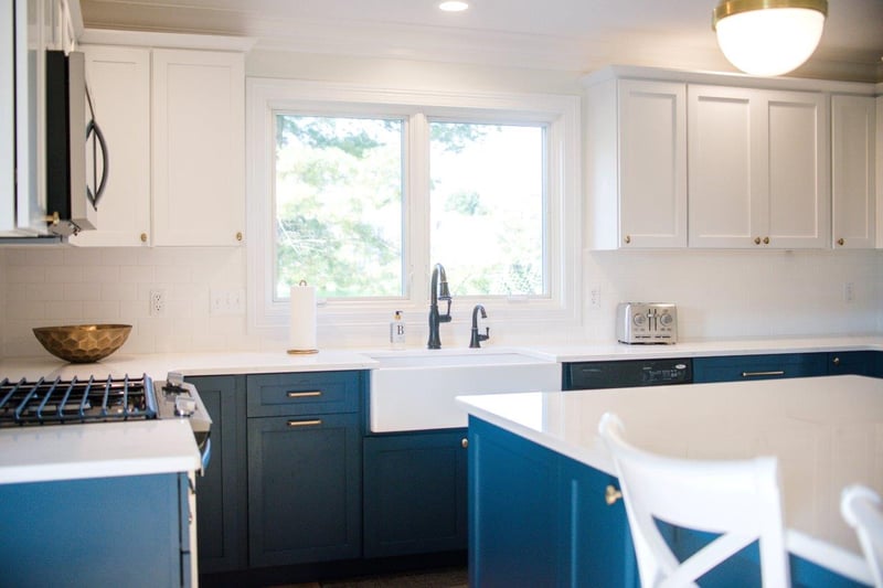Two-tone blue and white kitchen remodel with custom cabinetry