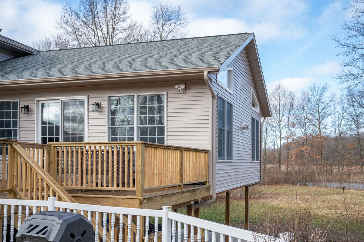 Raised pressure treated deck in South Bend by Peacock & Company