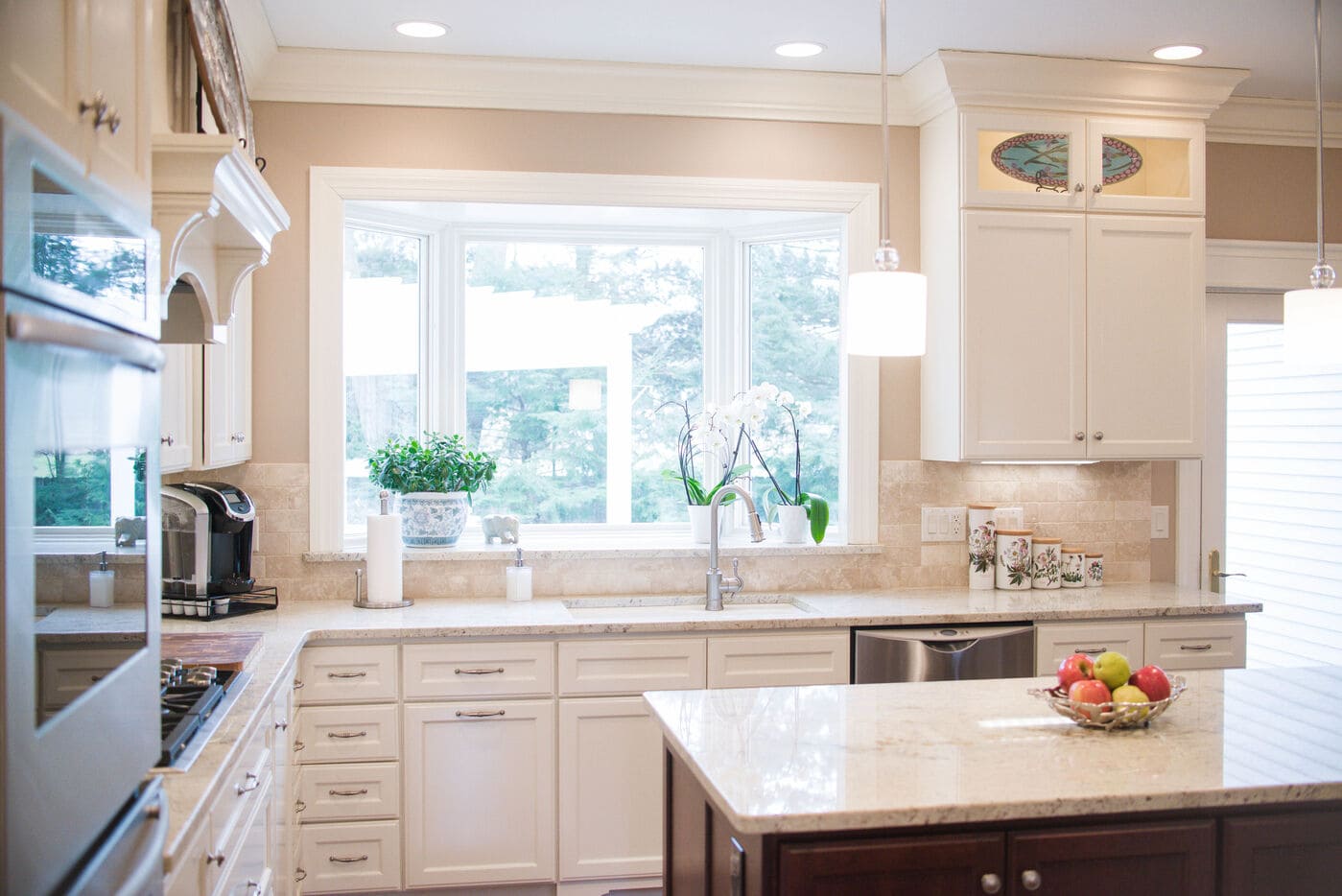 South Bend luxury kitchen remodel with window behind sink and recessed lighting