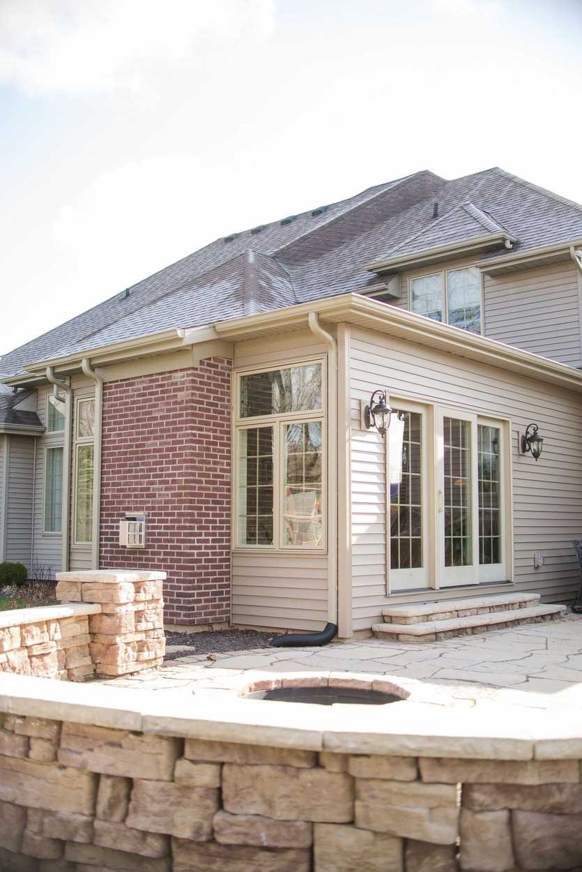 Exterior View of Sunroom Addition on Back of Home