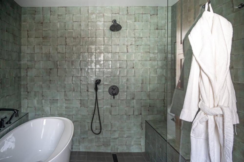 White robe hanging in Harbor Country, MI bathroom remodel by Peacock and Co.