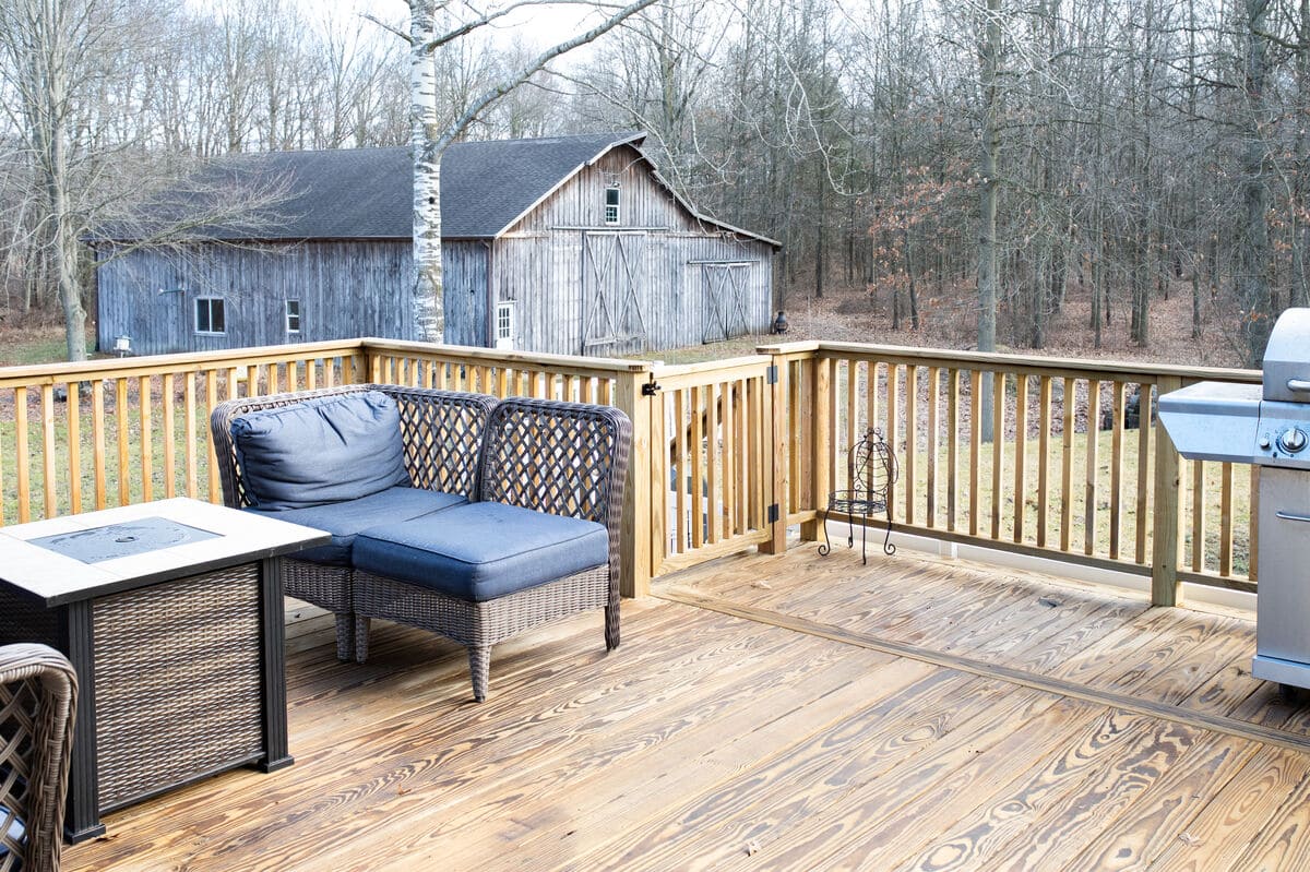 Wood decking and railing on South Bend, Indiana deck by Peacock & Company