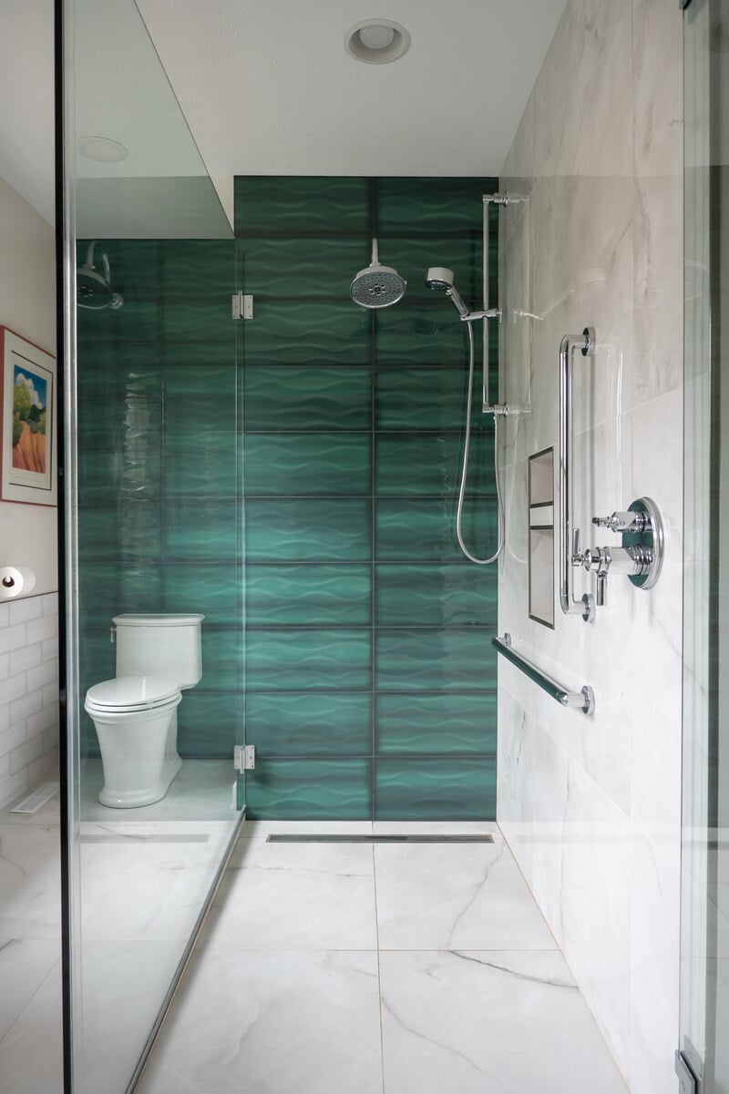 Peacock & Co.- South Bend barrier free shower and toilet with large format tile and green tile accent wall