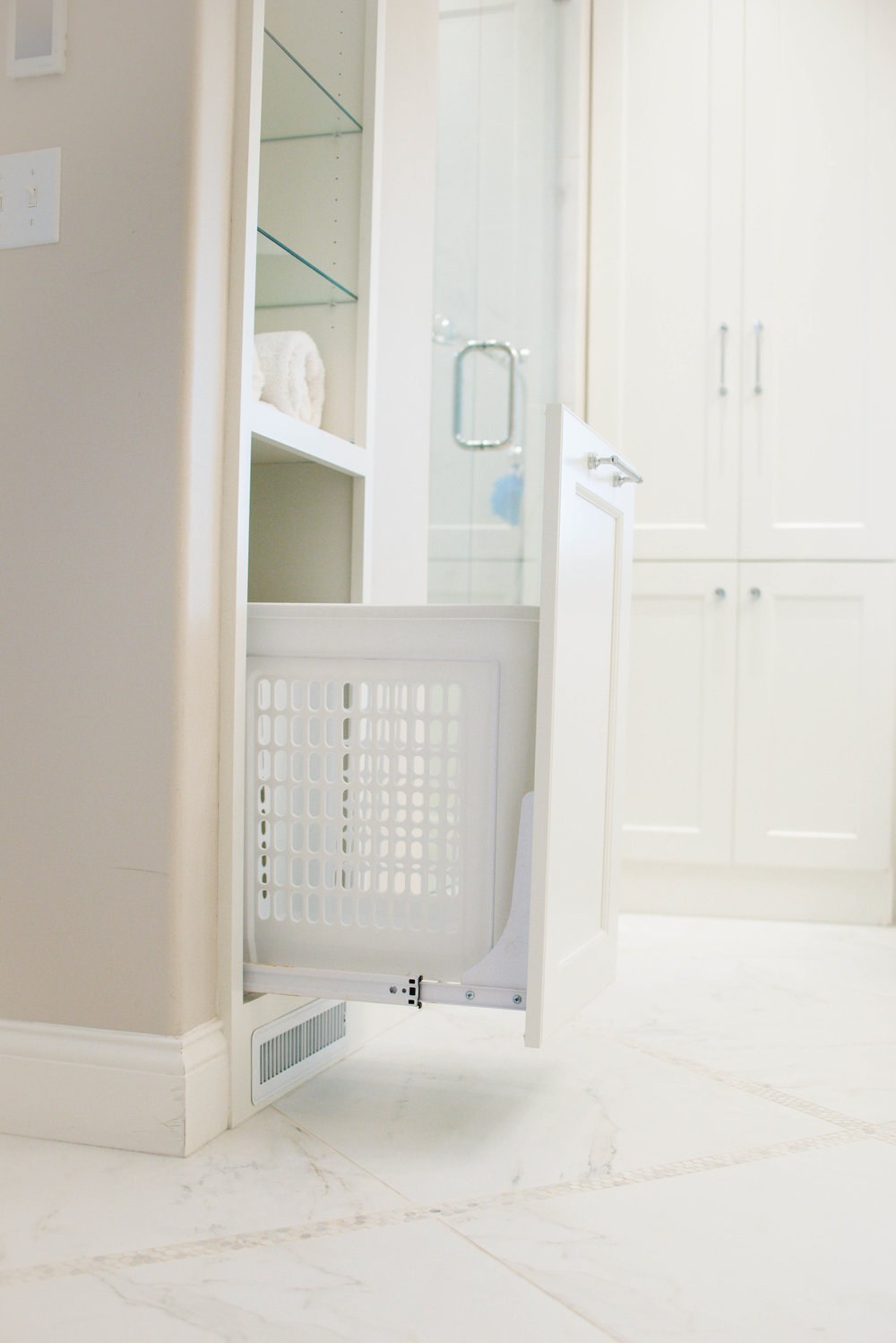 Bathroom flooring and custom laundry drawer