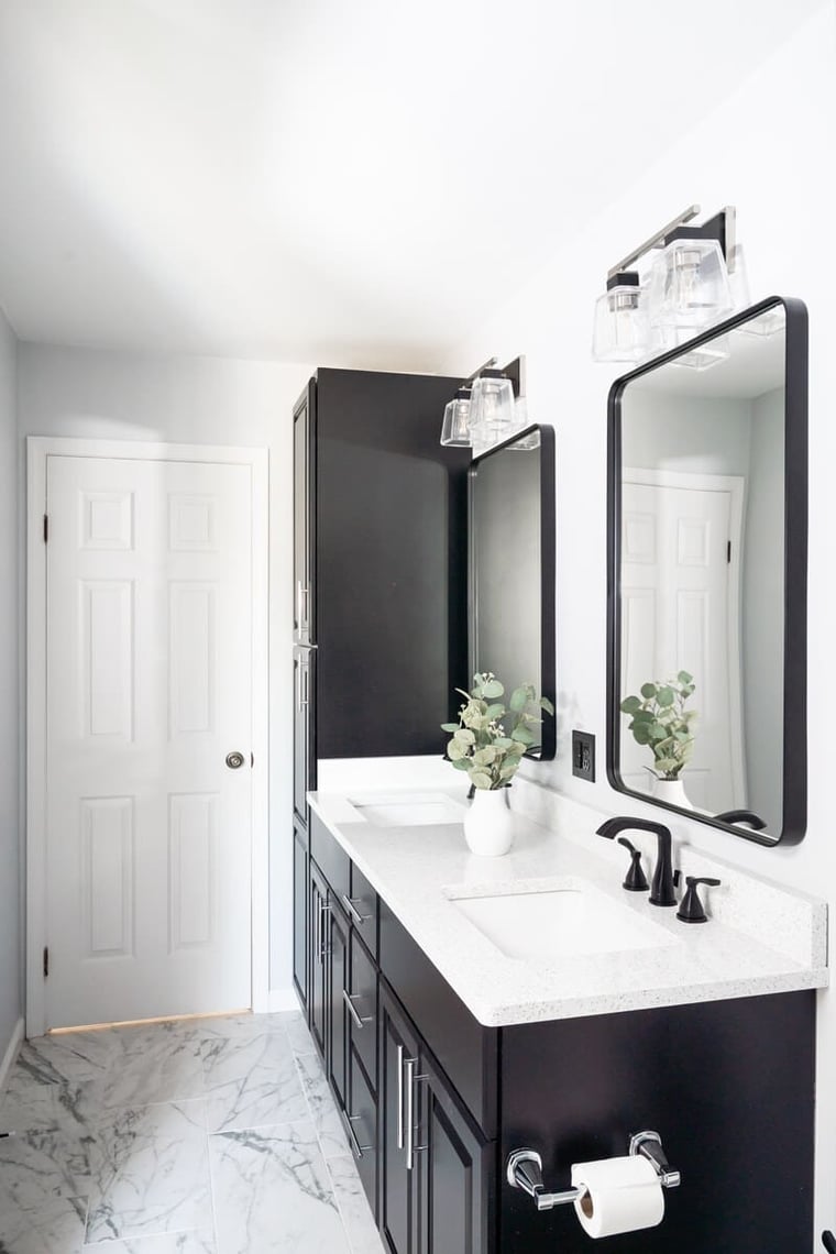 Black and white bathroom remodel design with double vanity