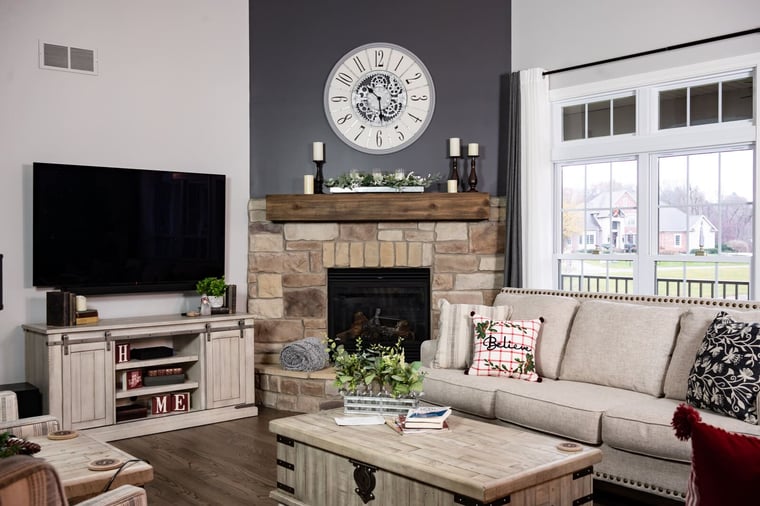 Custom living room interior with stone fireplace