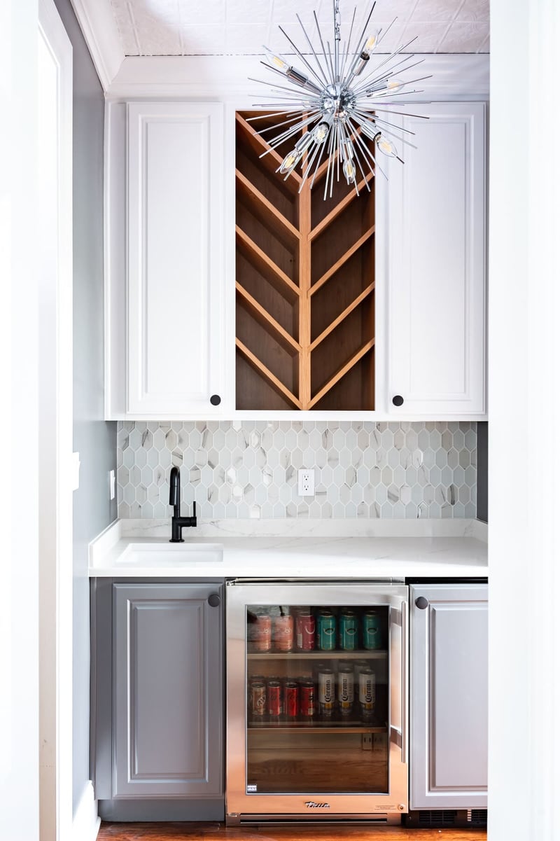 Modern beverage station with chrome lighting built-in wine storage and fridge