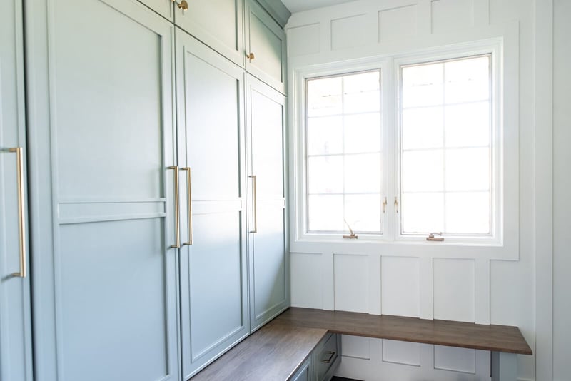 mudroom-renovation-with-pale-blue-custom-built-in-cabinets
