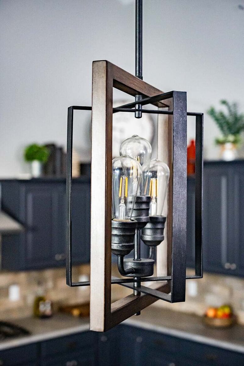 Up close view of kitchen light fixture with Edison bulbs