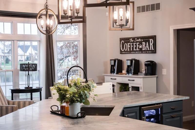 View of coffee bar area in kitchen with hanging pendant lights with Edison bulbs