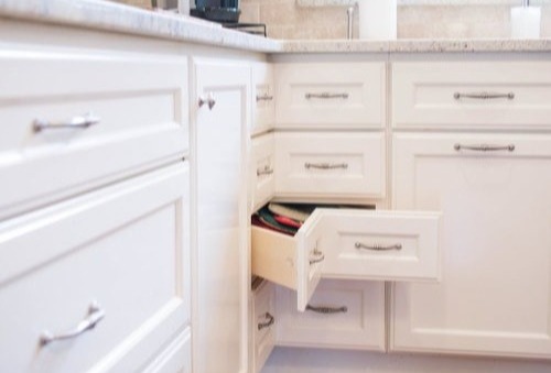 white custom cabinetry in kitchen remodel